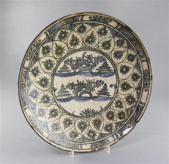 A Safavid stone paste Islands dish, 17th century, diameter 31cm